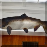 A11. Signed metal wall mounted fish sculpture. 